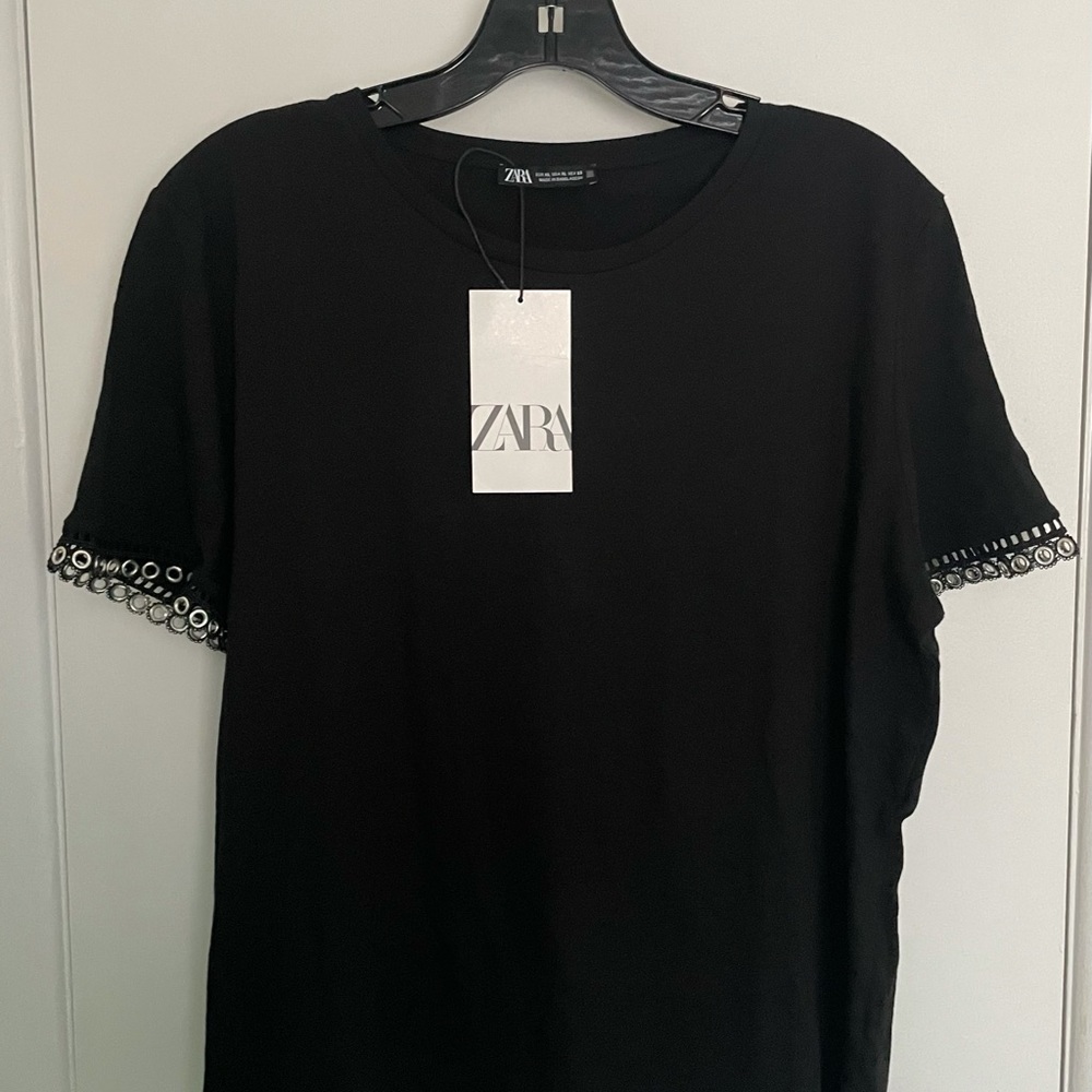 Zara shirt with contrasting rings on the sleeves